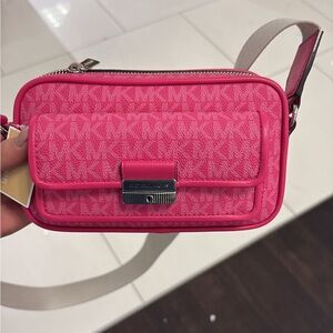 Michael Kors Pink Crossbody Bag with Textured Material and Metallic Clasp